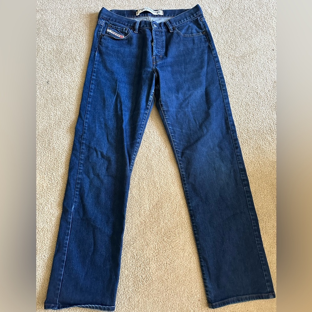 Diesel jeans boot cut with button up fly. RN 93243 CA 25594. Size 34